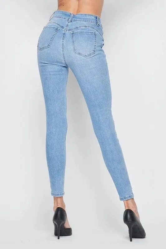 Figure Hugging Distressed Skinny Jeans